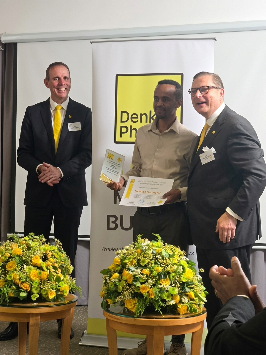 MayaMed Trading PLC receiving the Denk Pharma Top Volume Buyer 2025 award on stage with Denk Pharma executives