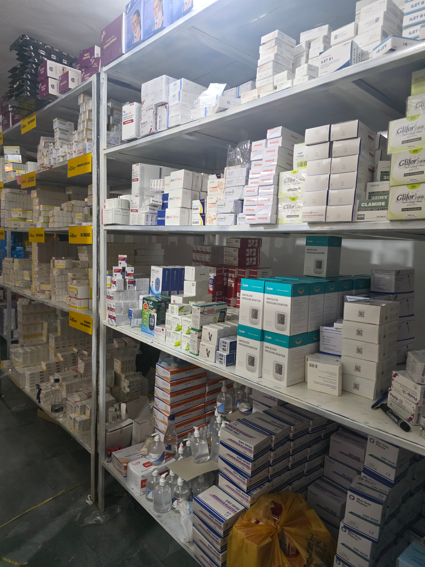 MayaMed warehouse shelves with categorised medicines and medical devices